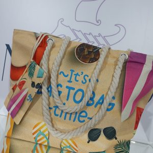 Γυναικεία υφασμάτινη τσάντα θαλάσσης BAG TO BAG σε μπεζ με μωβ αποχρώσεις.